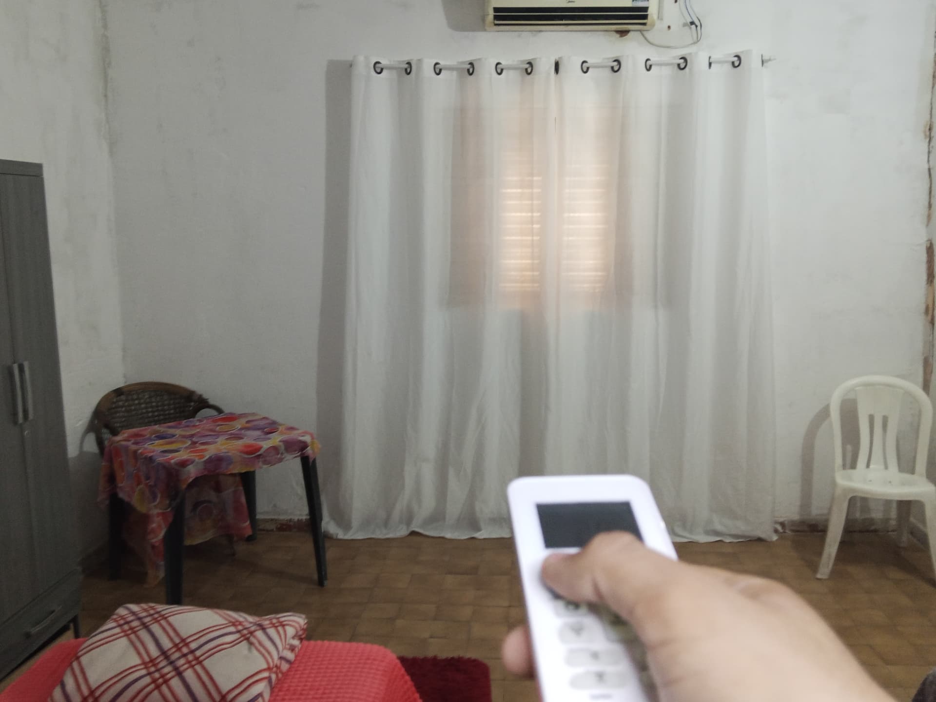 Quarto real com ar-condicionado